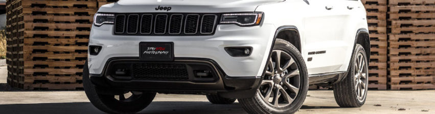 White Jeep with All-Season tires